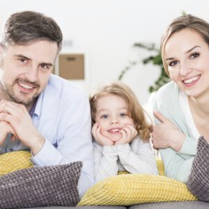 Man, woman and kid relaxing